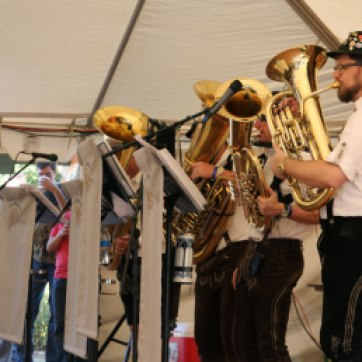 The Tuba Meisters band performs their renditions of several famous German songs. Band leader Ray Grim (far right) sings between blowing notes on the Tuba.