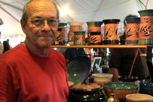 Ron Kuykendall displays his homemade pottery in the vendor's tent. This was Kuykendall's second year to sell at Oktoberfest.